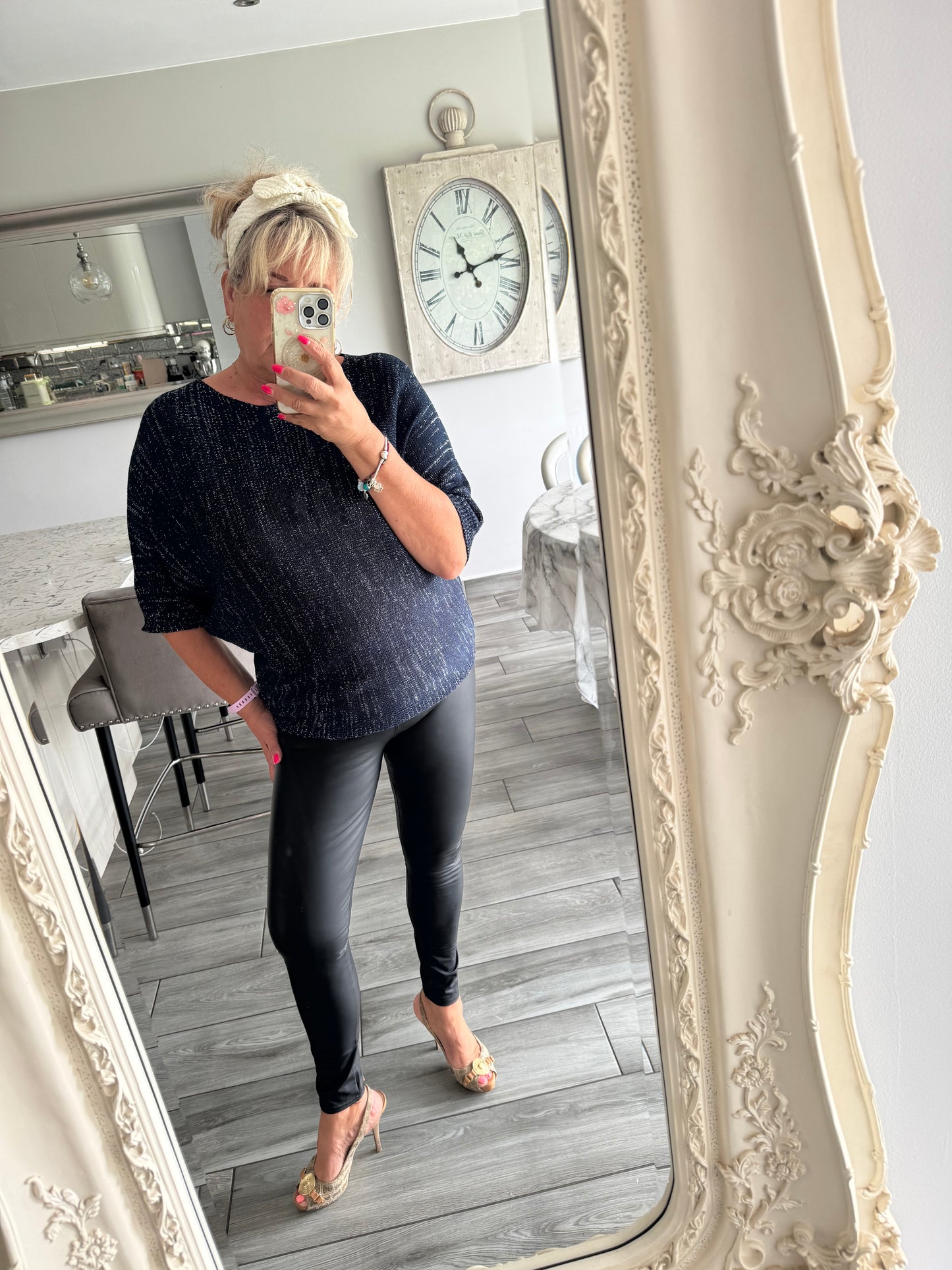 Arabella lightweight batwing jumper with silver fleck and daisies on the back