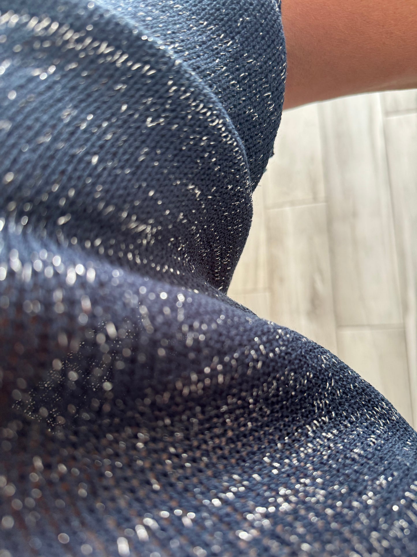 Arabella lightweight batwing jumper with silver fleck and daisies on the back