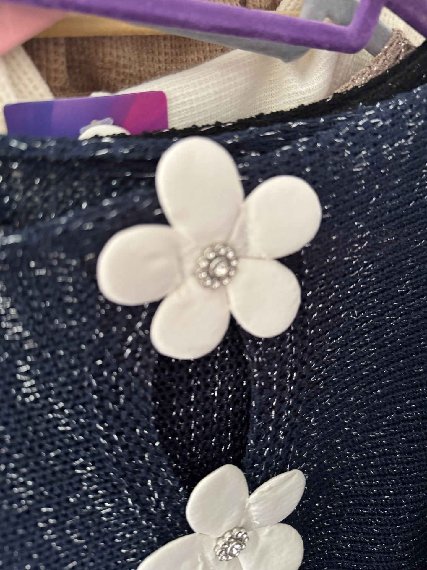 Arabella lightweight batwing jumper with silver fleck and daisies on the back