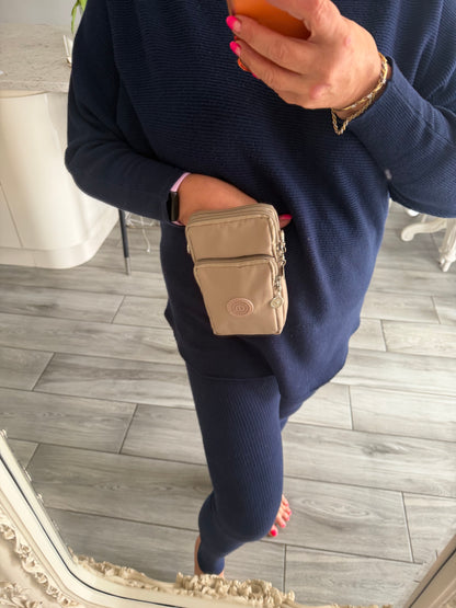 Rachel phone crossbody and can be put on a belt bag