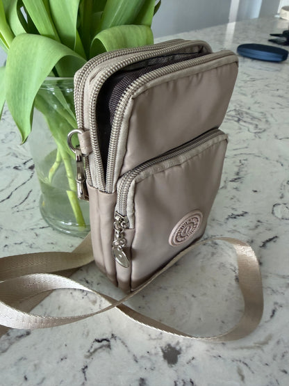 Rachel phone crossbody and can be put on a belt bag