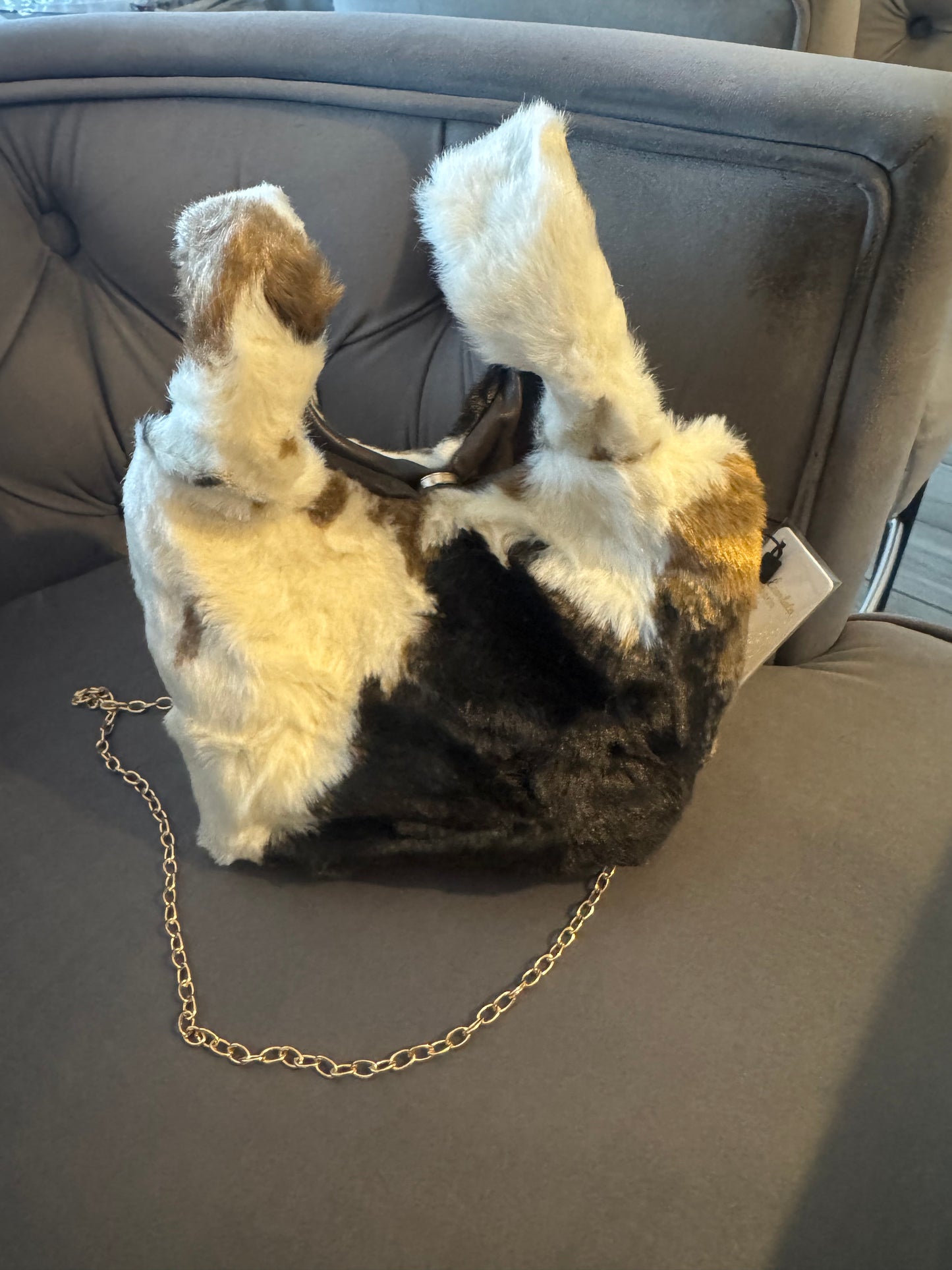 Dionne small flat faux fur bag with gold chain shoulder strap