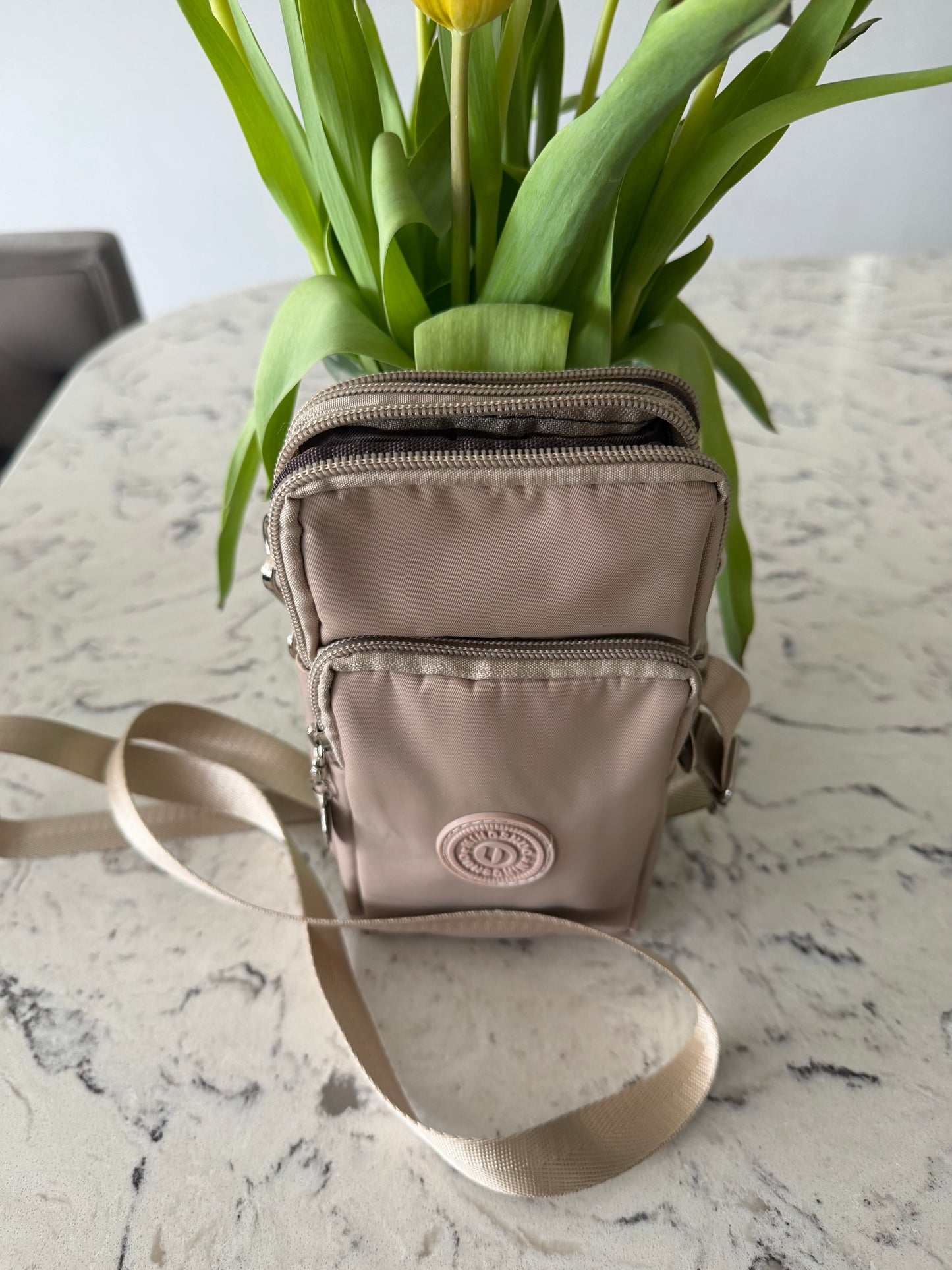 Rachel phone crossbody and can be put on a belt bag