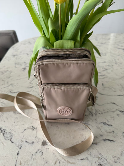 Rachel phone crossbody and can be put on a belt bag