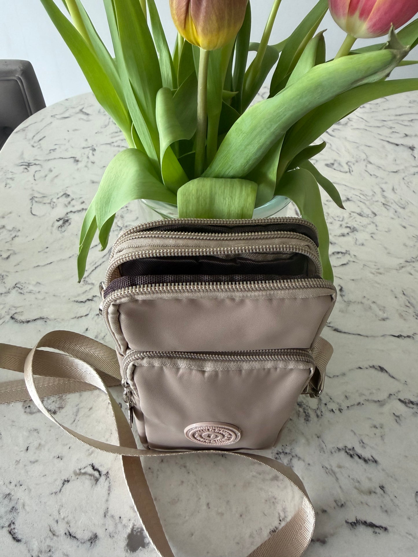 Rachel phone crossbody and can be put on a belt bag