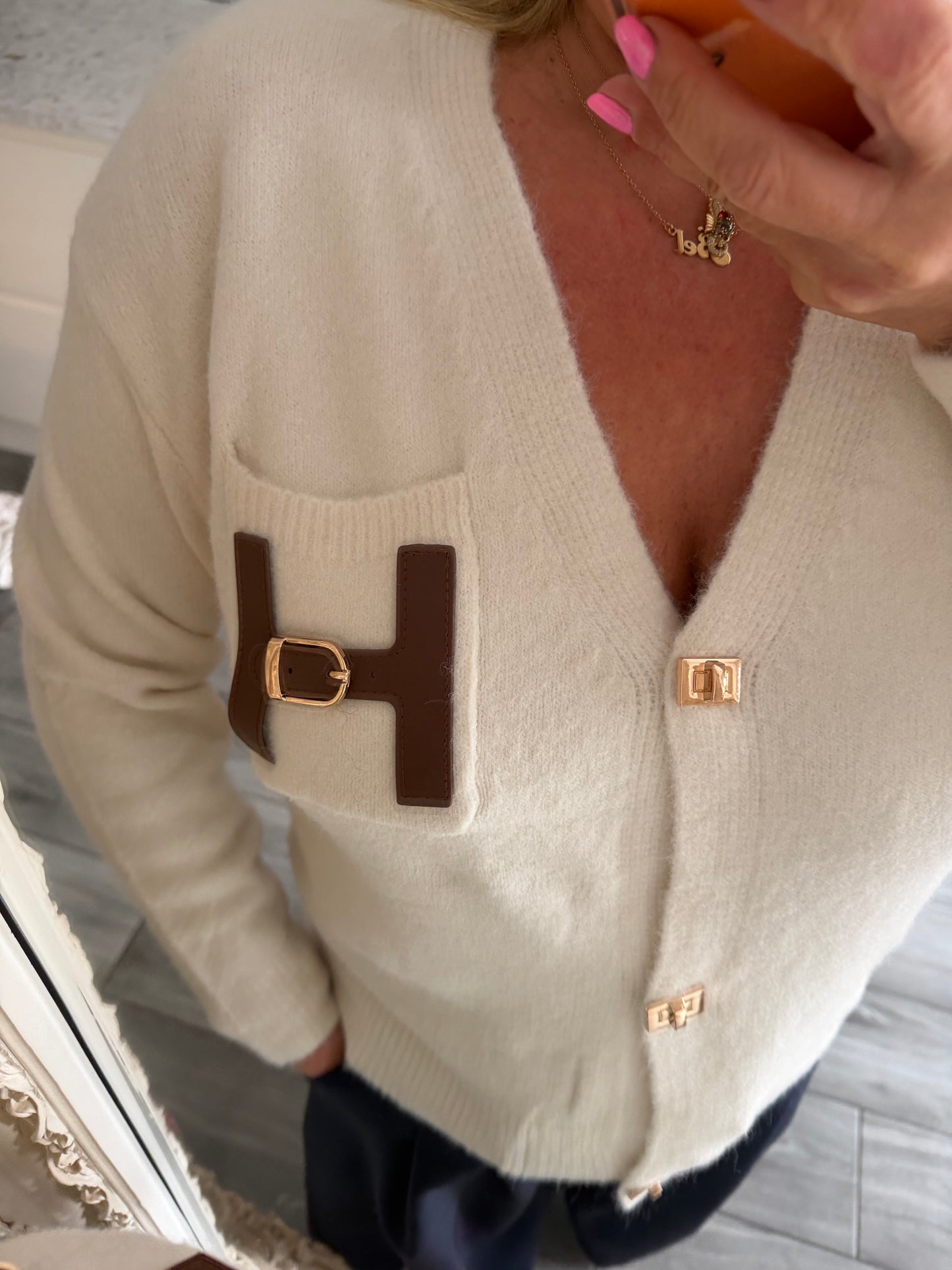 Tina H buckle detail cardigan with popper closure