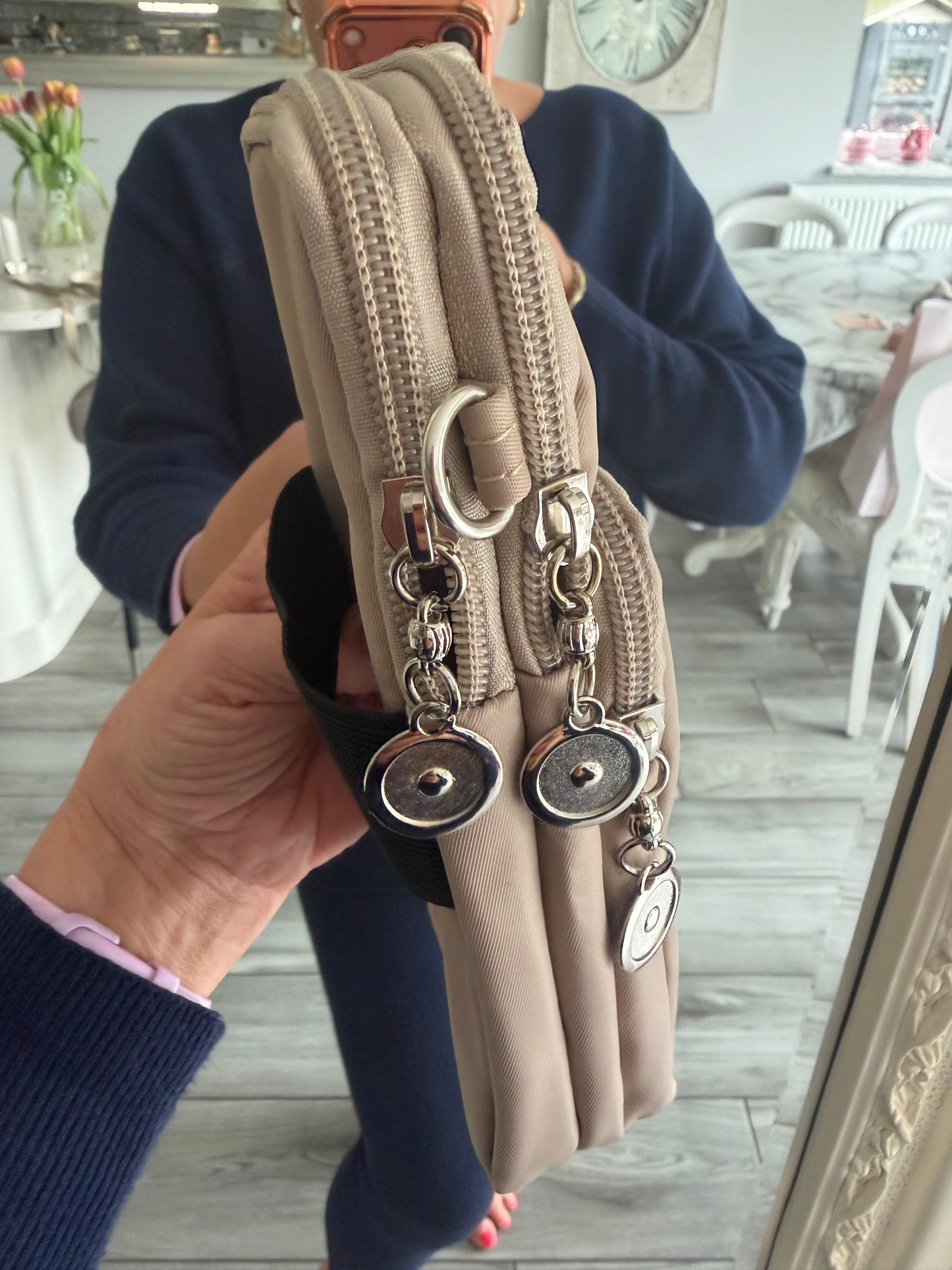 Rachel phone crossbody and can be put on a belt bag