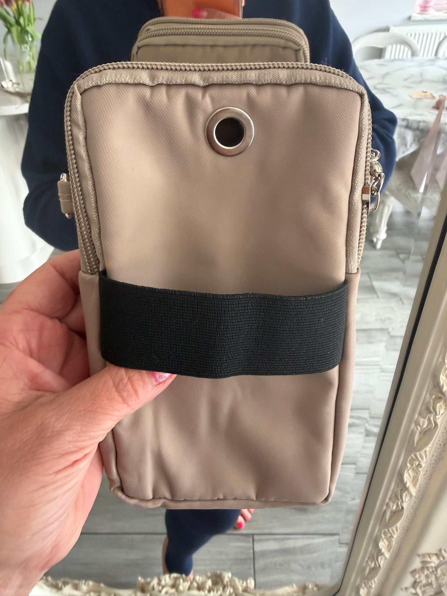 Rachel phone crossbody and can be put on a belt bag