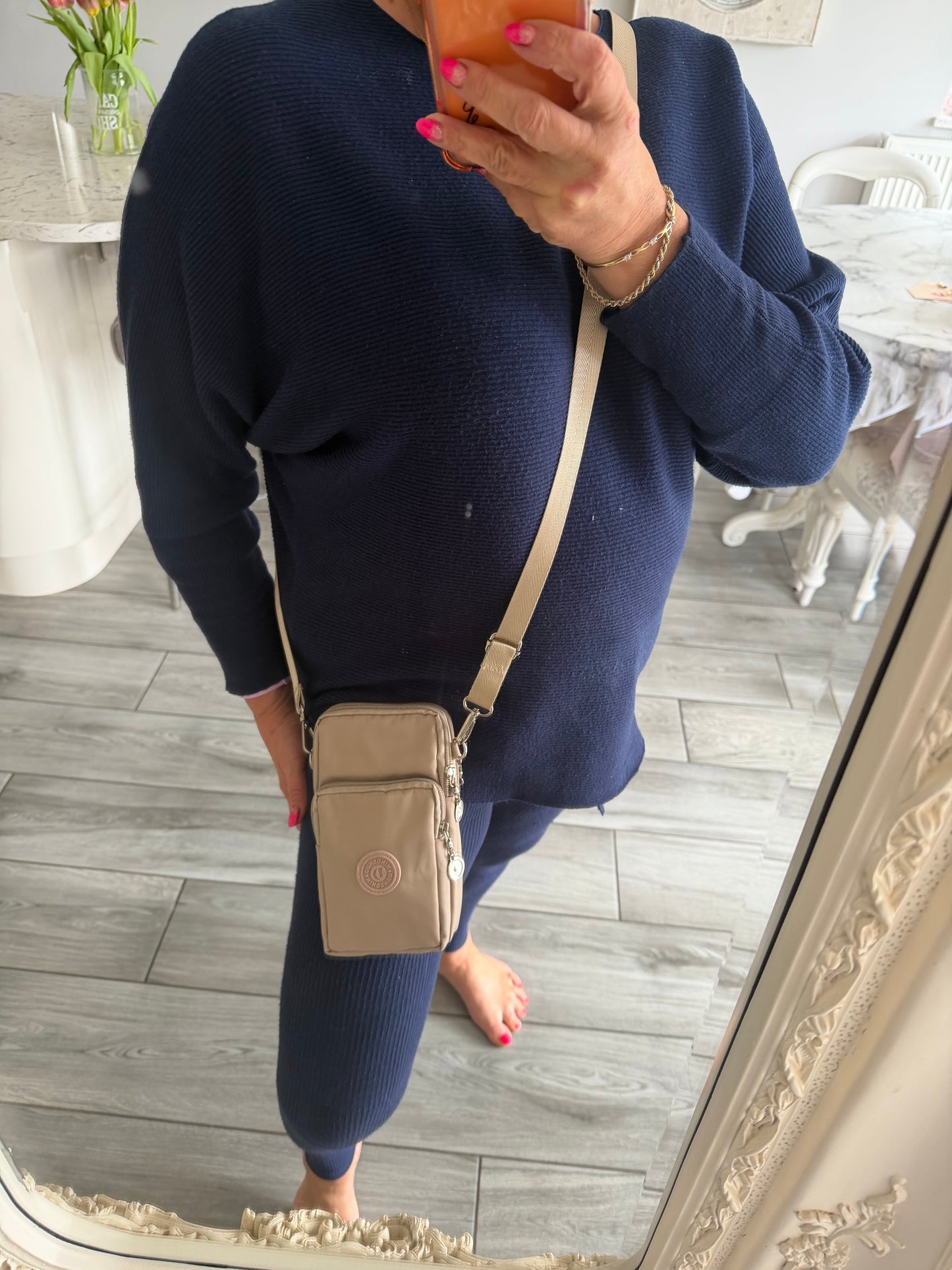 Rachel phone crossbody and can be put on a belt bag