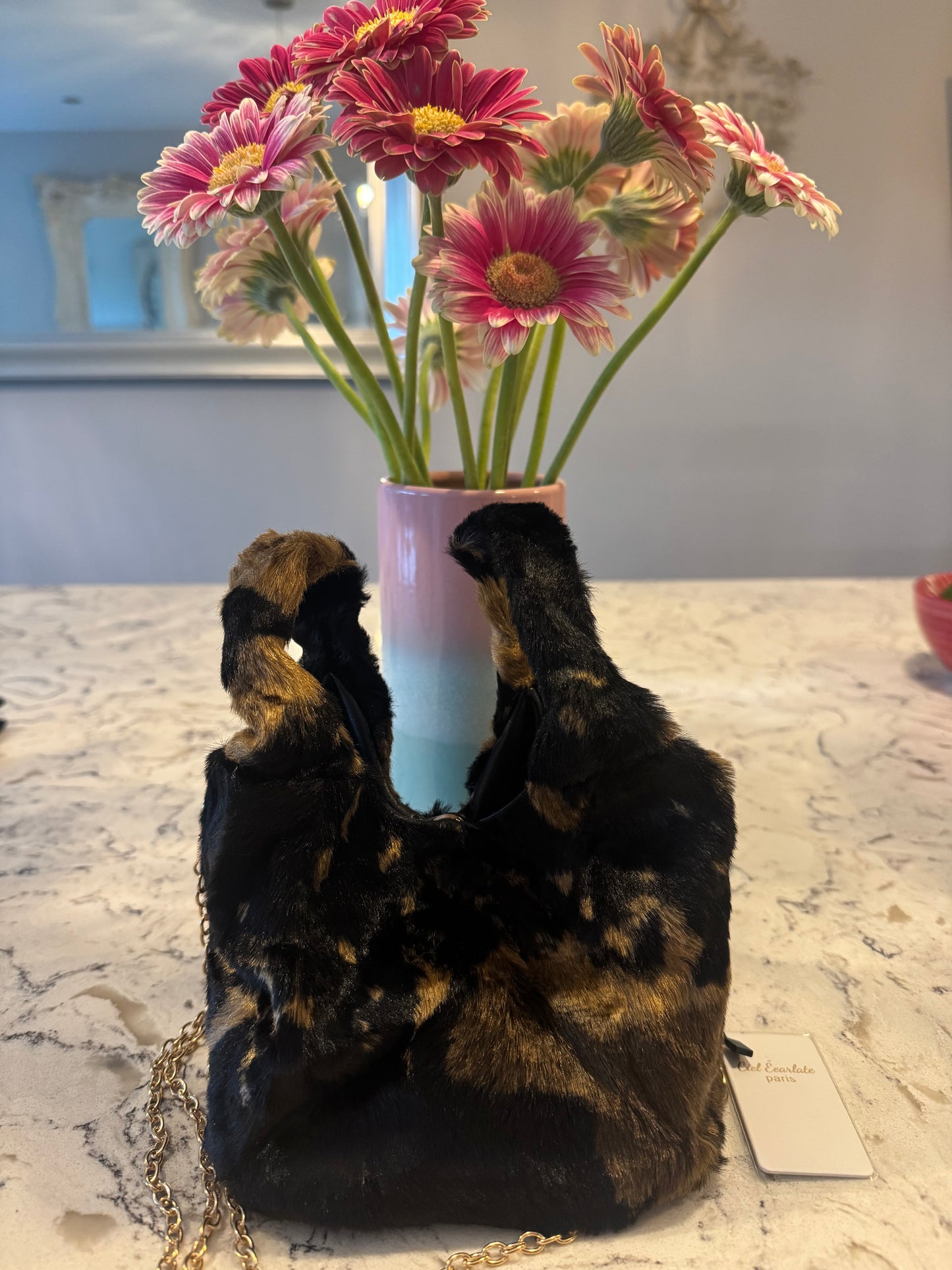 Dionne small flat faux fur bag with gold chain shoulder strap