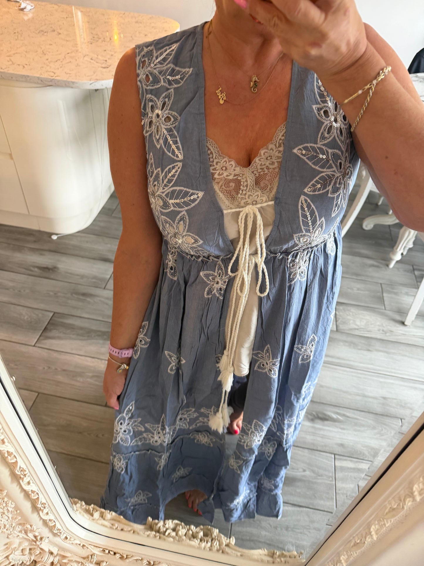 Netta sleeveless open dress with tassel ties
